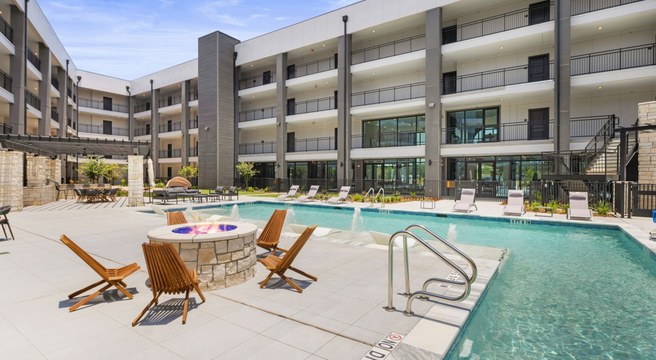 The Everson in Katy, Texas - wrap-style apartment pool deck and courtyard